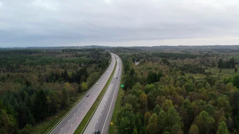 E6 Highway Through Forested Ridge Landscape Sweden Aerial 스톡 동영상 330983045