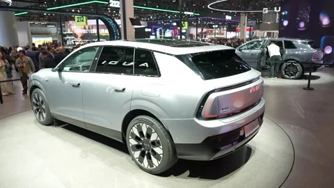 E7X electric concept car displayed at automotive exhibition, showcasing Stock Footage 334998945