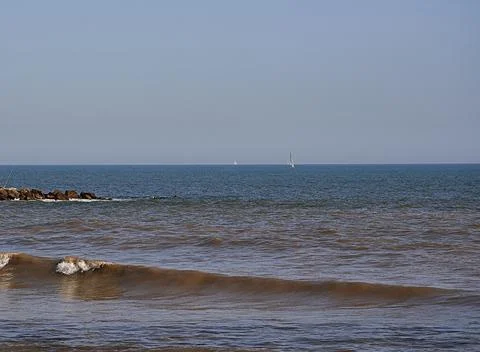 Each shore with breakwater Stock Photos