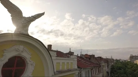 EAGLE. City. Roofs. Sky. Clouds. Light Video stock 94326914