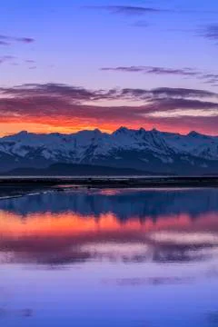 Eagle River and Eagle Beach during a brilliant coloured sunset and Chilkat Mount Stock Photos