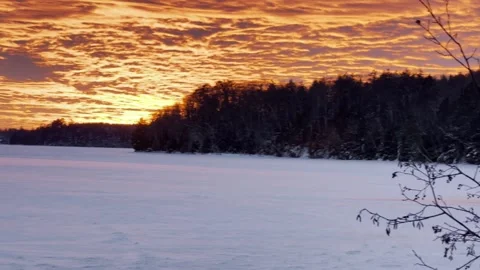 Eagle River Wiscosin winter sunset 库存影片 239026833