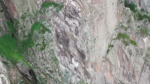 An eagle soars over the rocky mountains Stock Footage 289626243