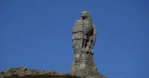 Eagle statue, Slow motion handheld view of a bird monument, on the top of sim Stock Footage 84508200