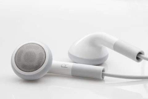 Ear buds isolated on a white background. Stock Photos