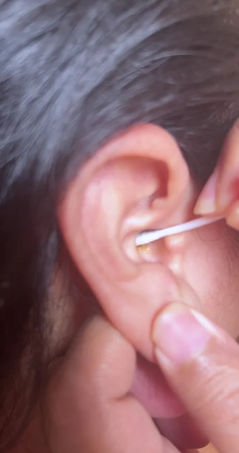 Ear Cleaning activity Close Up Footage Stock Footage 328511012