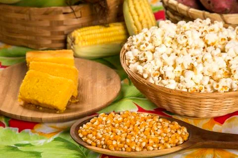 Ear of corn, revealing yellow kernels Stock Photos