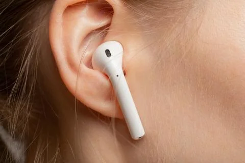 Ear with earphone Photos