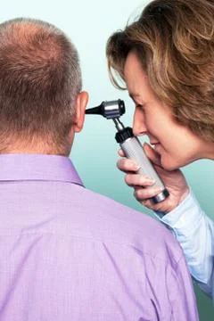 Ear examination Stock Photos