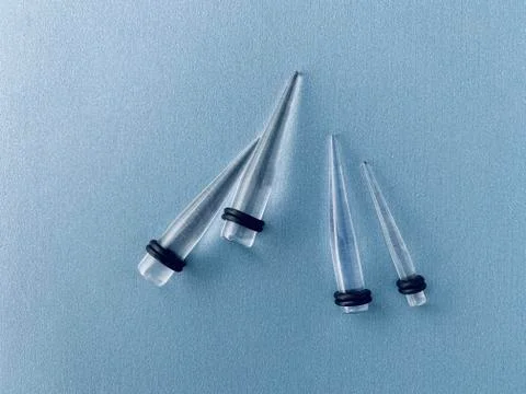 Ear Tunnels Stock Photos