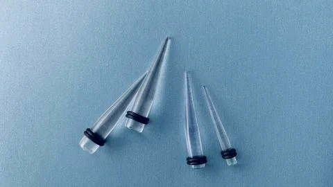 Ear Tunnels Stock Photos