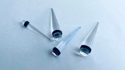 Ear Tunnels Stock Photos