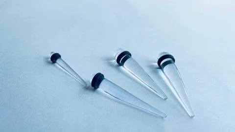 Ear Tunnels Stock Photos