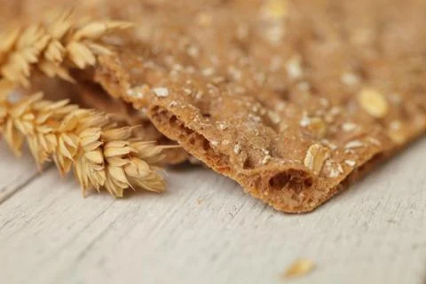 Ear of wheat with a wheat cracker or crispbread Foto stock
