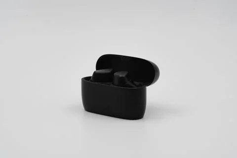 In the in -ear wireless Bluetooth headphone set box Stock Photos