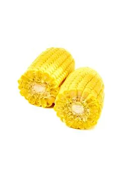 Ear of young appetizing corn split into two halves on white background, ver.. Stock Photos