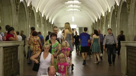 Early 2000's people going down to underground subway Stock Footage 208677966