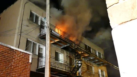 Early arrival at structure fire at night 動画素材 120108476