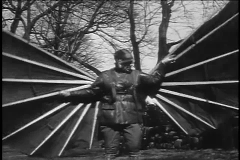 Early Attempts at Flying - People in Winged Apparatus Trying to Fly - Archival Stock Footage 194977528