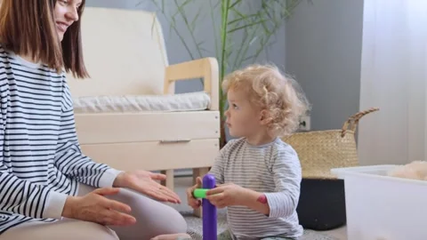 Early childhood development through play. Educational toys for toddlers. In.. Stockbeeldmateriaal 252140521