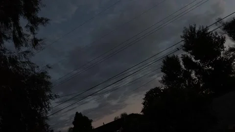 Early Dawn Sky With Cloud, Power Line and Trees, Dark Dawn Sky Stockbeeldmateriaal 252565104
