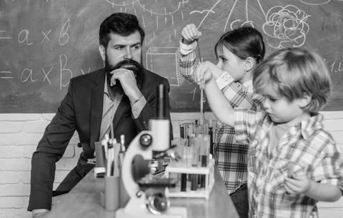 Early development of children. back to school. microscope optical instrument at Stock Photos