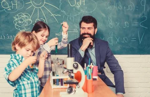 Early development of children. microscope optical instrument at science Stock Photos