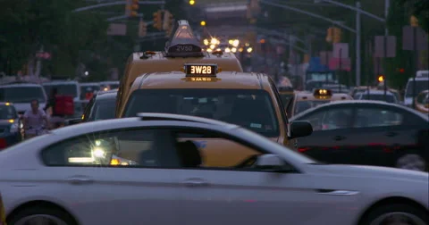 Early evening traffic in slow motion on busy street in New York City. Stock Footage 67263060