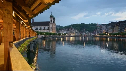 Early Evening View of Chapel Bridge and the River Reuss in Lucerne Switzerland Video stock 319981474