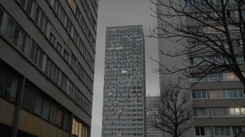 Early Evening View Of High Rise Tower Apartments In Paris With Tree Stock Footage 124418060
