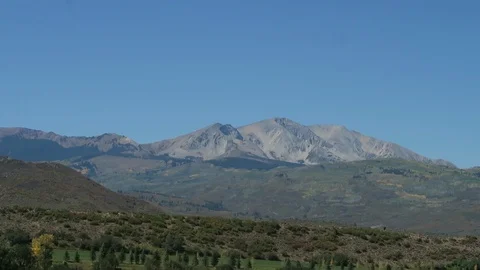 Early fall view across the Snowmass valley to Mount Sopris. Video stock 97400800