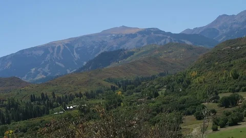 Early fall view across the Snowmass valley to the Snowmass ski resort. Video stock 97402144