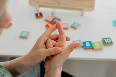 Early math practice hands Stockfoto's