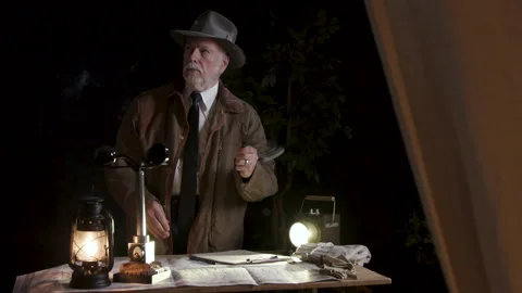 Early meteorologist using a Whirling Psychrometer For Testing Humidity And Te Stock Footage 344461569
