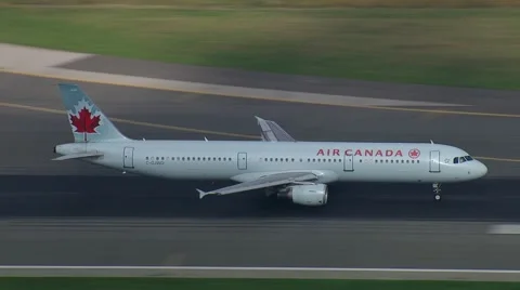 Early Morning Air Canada 321 Takeoff Track Stock Footage 59883889