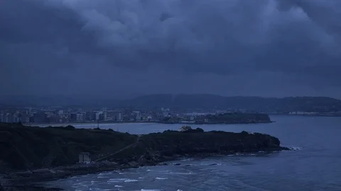 Early morning dramatic clouds seaside timelap with cliffs and green grass, ocean Stock Footage 92576166