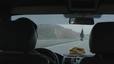 Early morning drive captured from the driver's perspective, where the simplicity Stock Footage 258353096