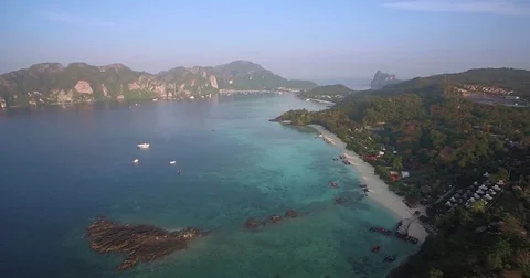 Early Morning at Long Beach, Phi Phi Islands, Thailand, Ascending Aerial Pan Stock Footage 78773463