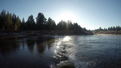 Early morning Reflective sunlight glowing through the fresh water. 4K Oregon Stock Footage