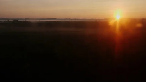 Early morning on the road. View from the train window - the rising sun, trees Stock Footage 78501826