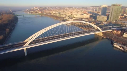 Early morning sunrise aerial Apollo Bridge in Bratislava Stock Footage