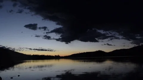 Early morning sunrise over lake Stock Footage