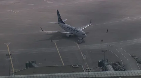 Early Morning WestJet Pushback Stock Footage 59883888