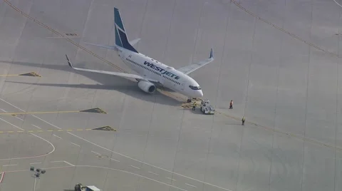 Early Morning WestJet Ready To Go Stock Footage 59883305