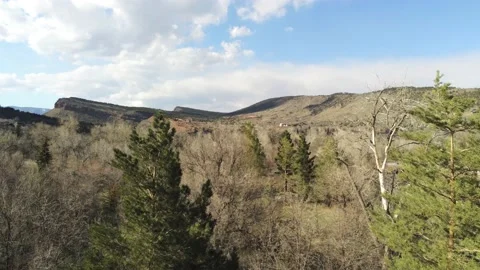 Early Spring in mountains - Drone camera moves up and left Stock Footage 138262118