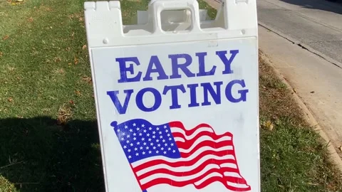 Early Voting Here sign - Tilt Stock Footage 219651765