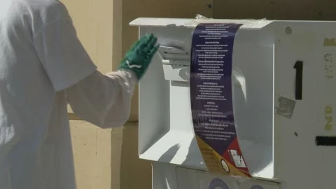 Early Voting: Mail In Ballot Drop Off: 2020 Election Stock-Footage 141391173
