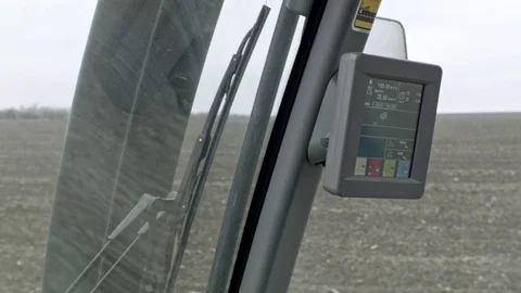 Early winter field view from moving modern tractor Stock Footage 70082077