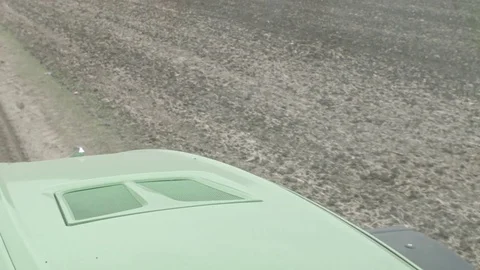 Early winter field view from moving modern tractor Stock Footage 70082210