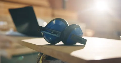 Earmuffs, carpentry and workshop with safety tools, woodwork and noise reduction Stock Footage 341388910